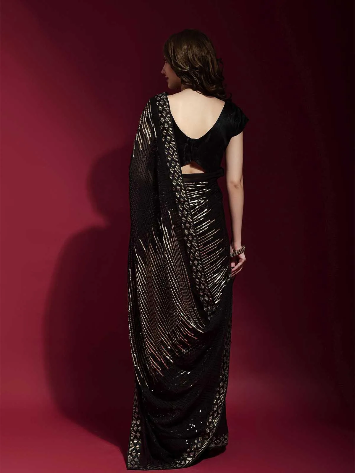 Odette Women Black And Gold Georgette Sequence Saree With Unstitched Blouse