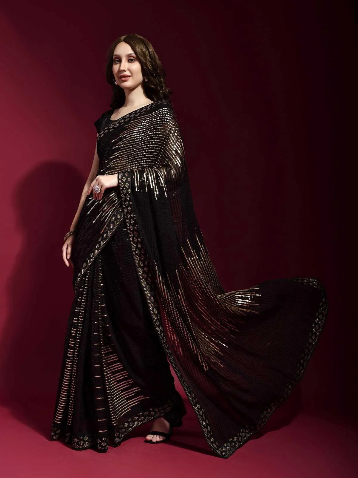 Odette Women Black And Gold Georgette Sequence Saree With Unstitched Blouse